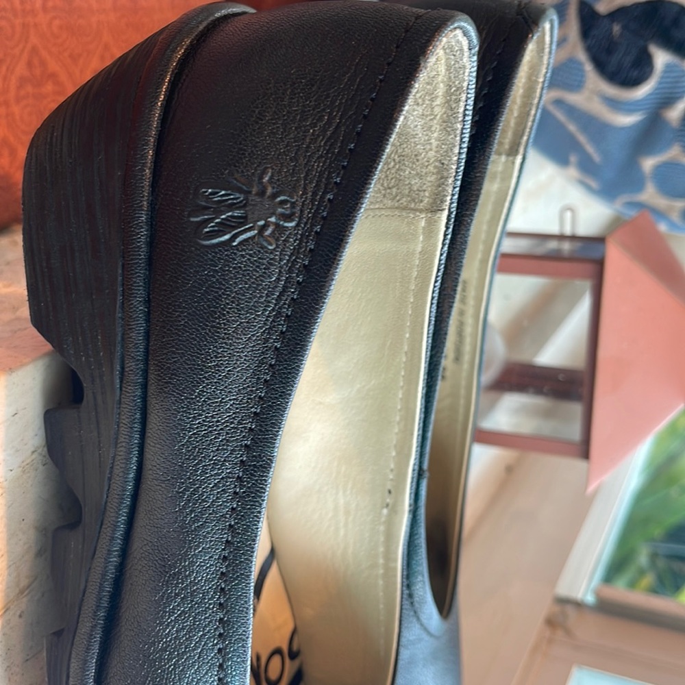 Black leather FLY London shoes